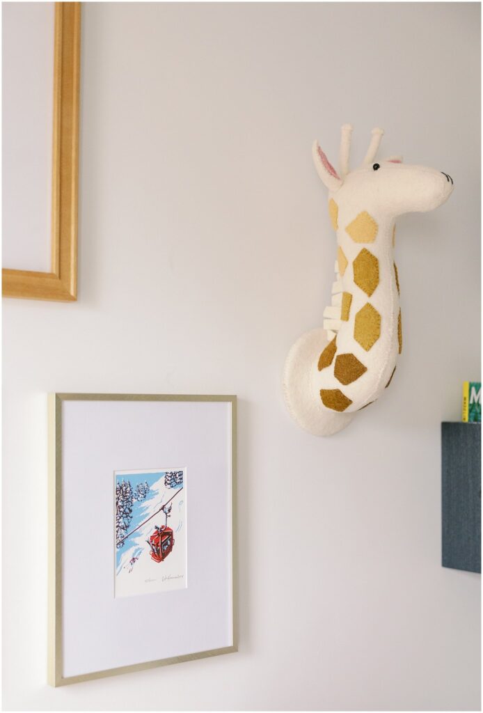 Giraffe wall decor in nursery. Boston newborn session Deborah Zoe Photography.