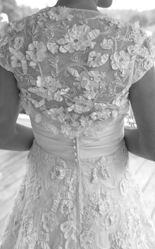 Close up detail of embroidered wedding dress. Vermont Wedding Photographer Deborah Zoe Photography