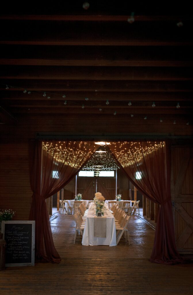 Dinner reception details with draping. Vermont Wedding Photographer Deborah Zoe Photography