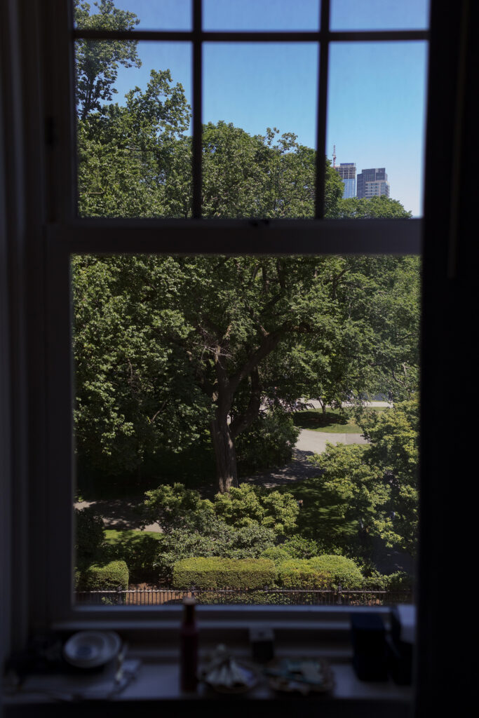 View of Boston Public Garden from a room at the Newbury Boston hotel. Modern Summer Wedding at the Newbury Boston Hotel photographed by Deborah Zoe Photography. 