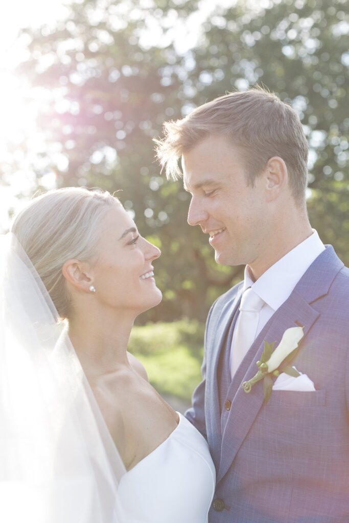 Bride and Groom look into each other's eyes. Coastal New England Wedding.