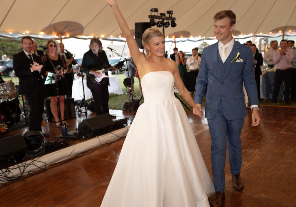 Bride and Groom celebrate on the dancefloor after their first dance. Coastal New England Wedding.